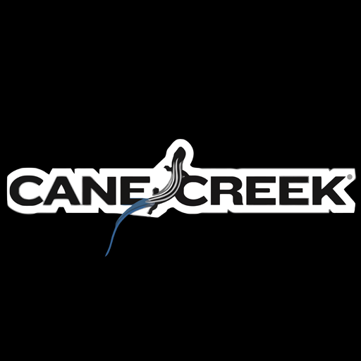 Cane Creek Cycling Components logo with the company name in a distinctive font and a stylized graphic element resembling a creek or wave.